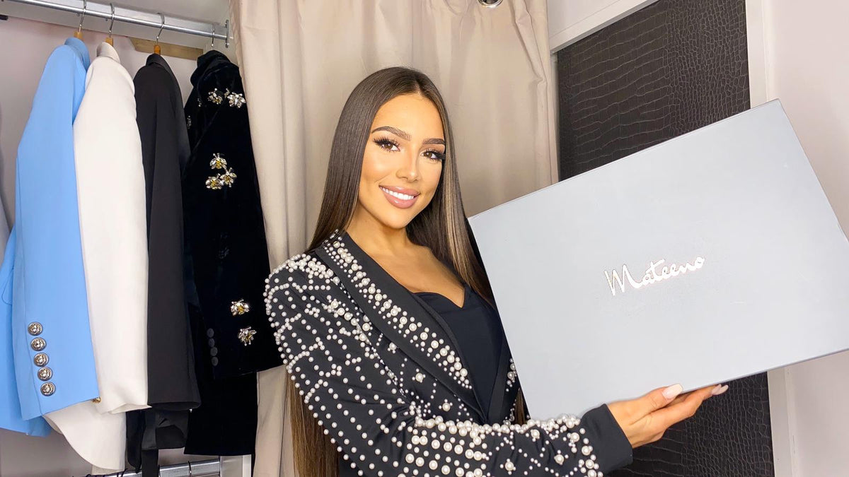 Helena Bu holding a Mateeno box wearing the La Perla embellished beaded blazer